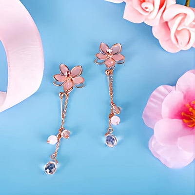 Sakura shaped earrings with gold accents